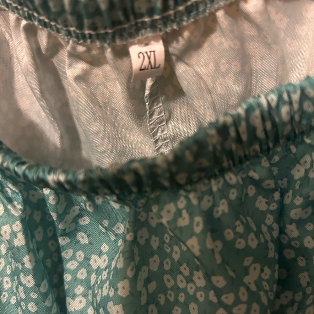 Dress. Could be used for a swimsuit cover up as well. Silky material.